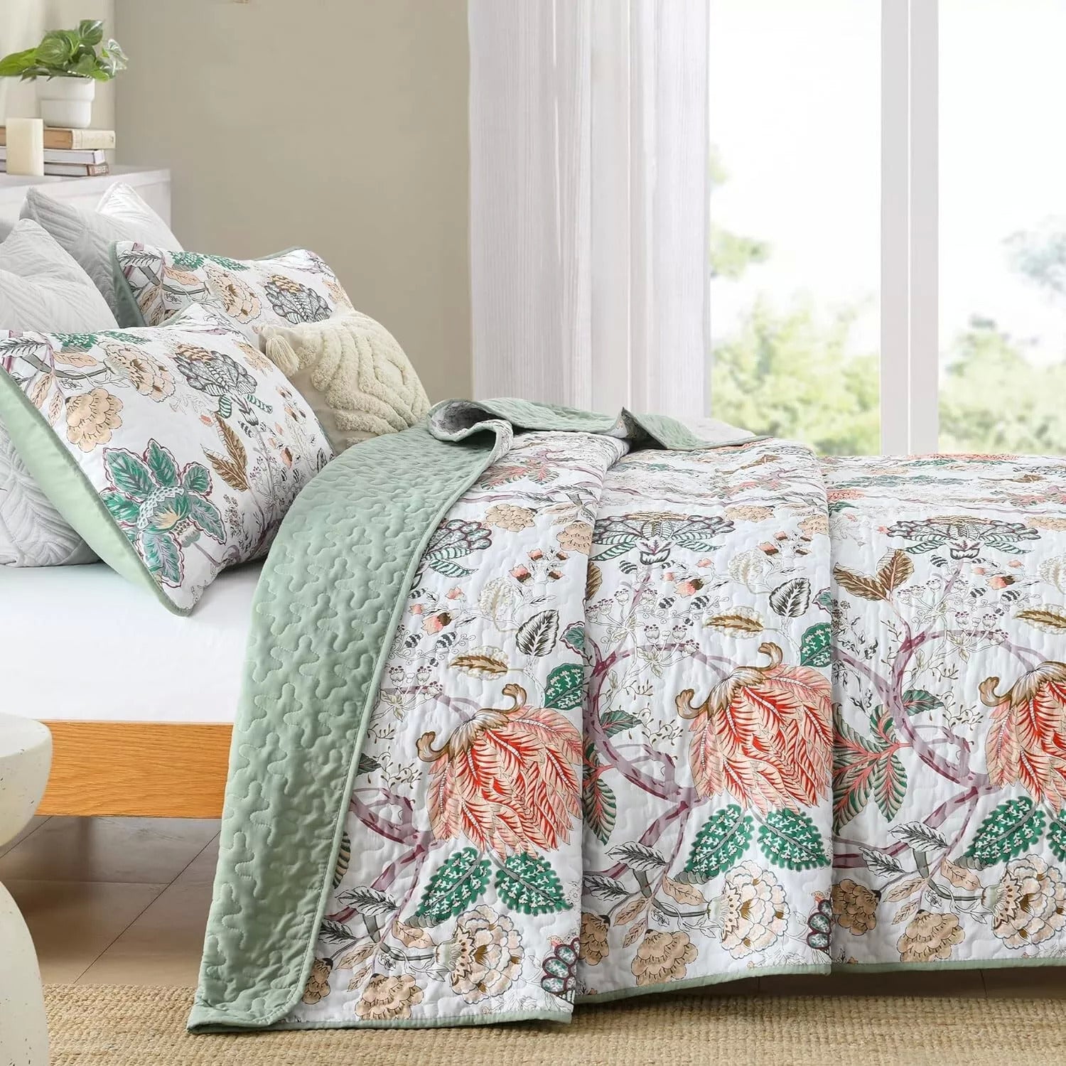 Understated Quilted coverlet and pillowcovers set: Subtle Elegance - Queen size with floral pattern and soft green quilted reverse on bedzy bed