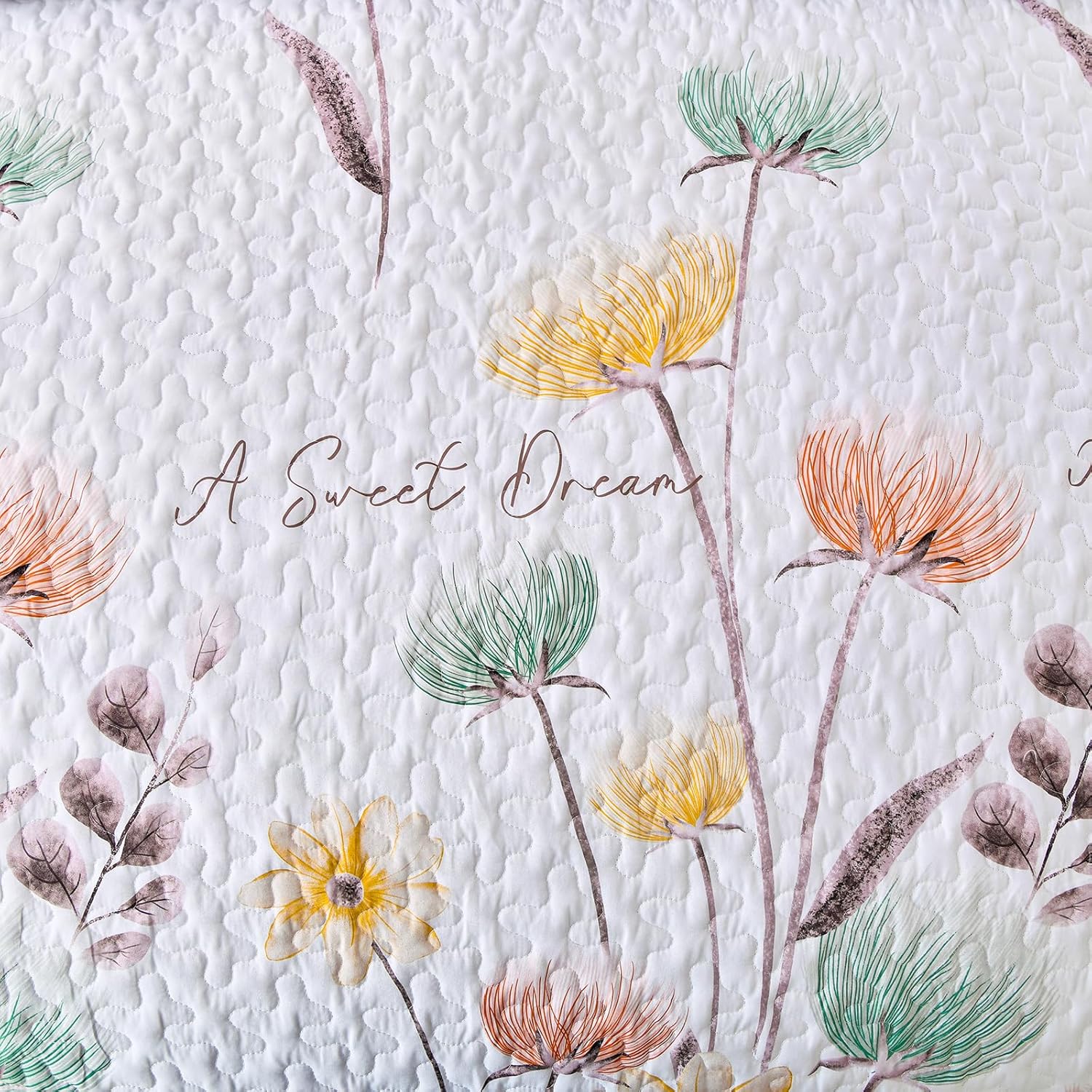 Close-up of Intricate Quilted Coverlet and Pillowcases Set: A Work of Art for Your Bedroom - Queen size with floral pattern and text "A Sweet Dream
