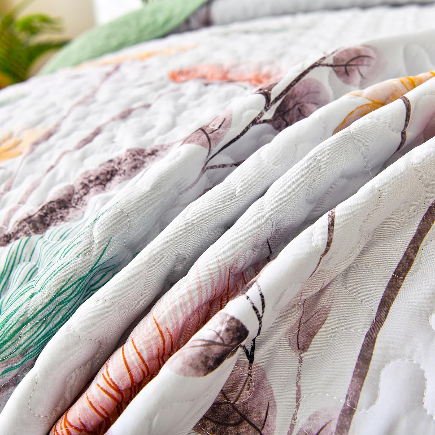 Intricate Quilted Coverlet and Pillowcases Set: A Work of Art for Your Bedroom - Queen size with detailed floral stitching and soft texture
