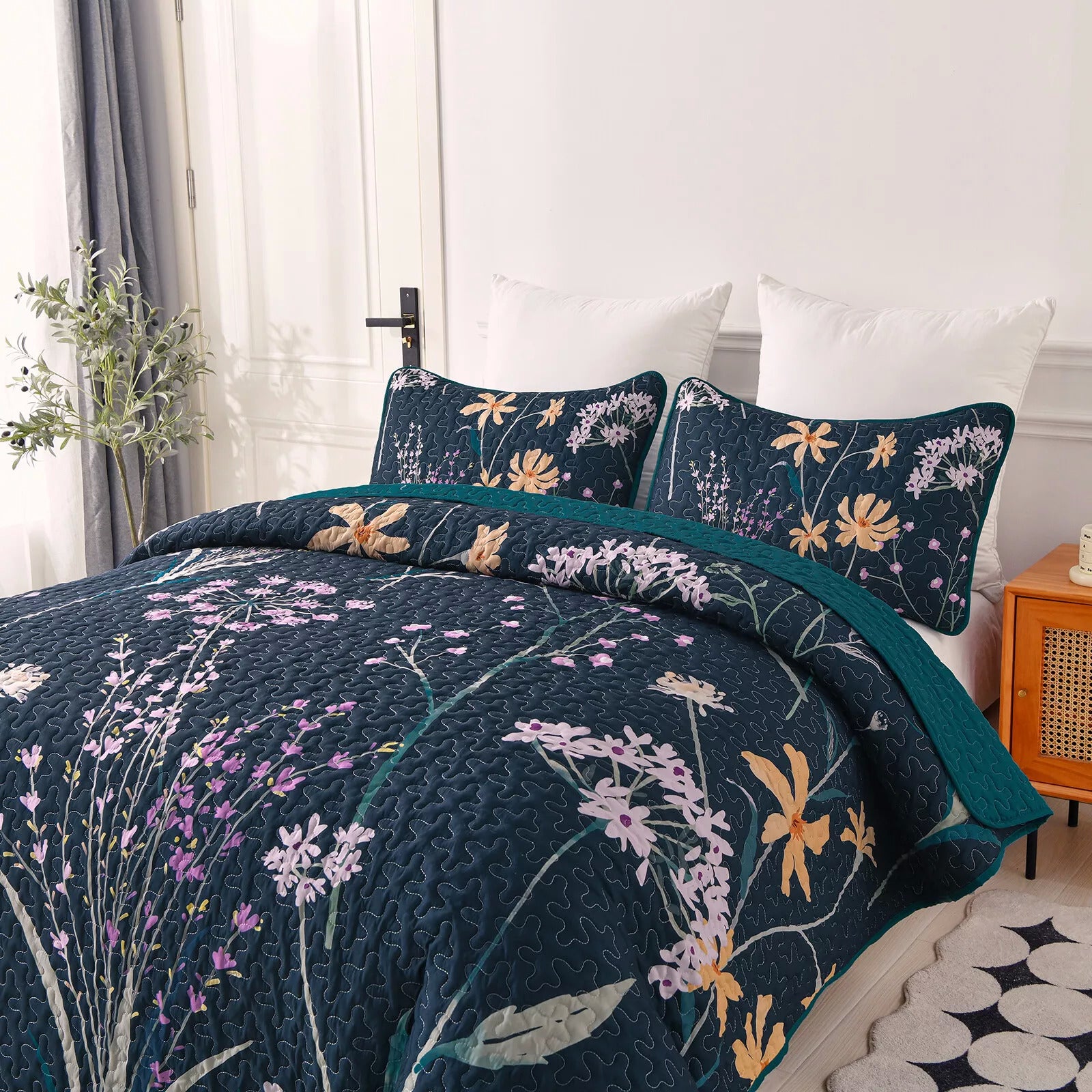 Abstract Quilted coverlet and pillowcovers set: Unique and Artistic - Queen size with floral pattern on a styled bedroom bed by Bedzy