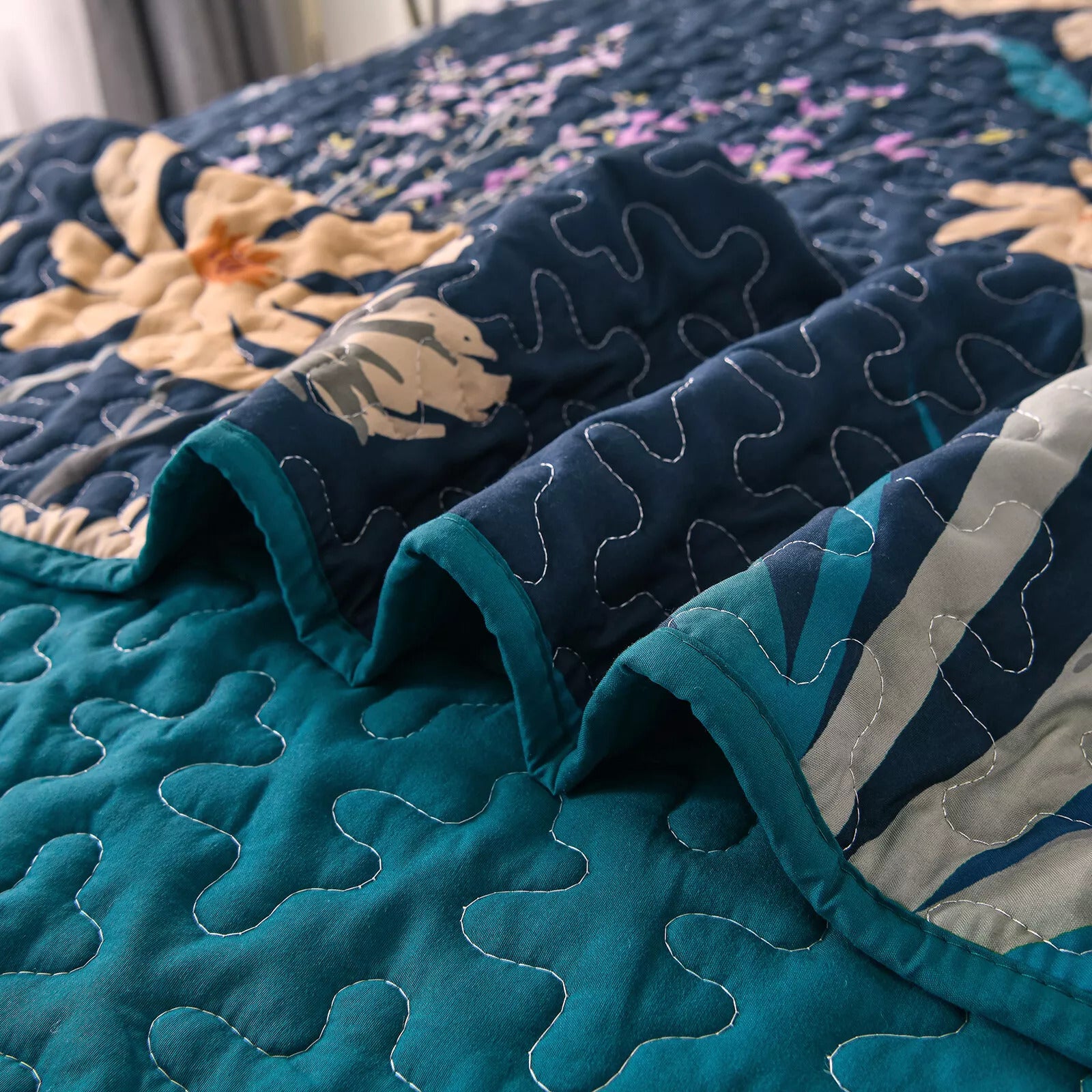 Abstract Quilted coverlet and pillowcovers set: Unique and Artistic - Queen size with detailed stitching and floral pattern in bedroom setting