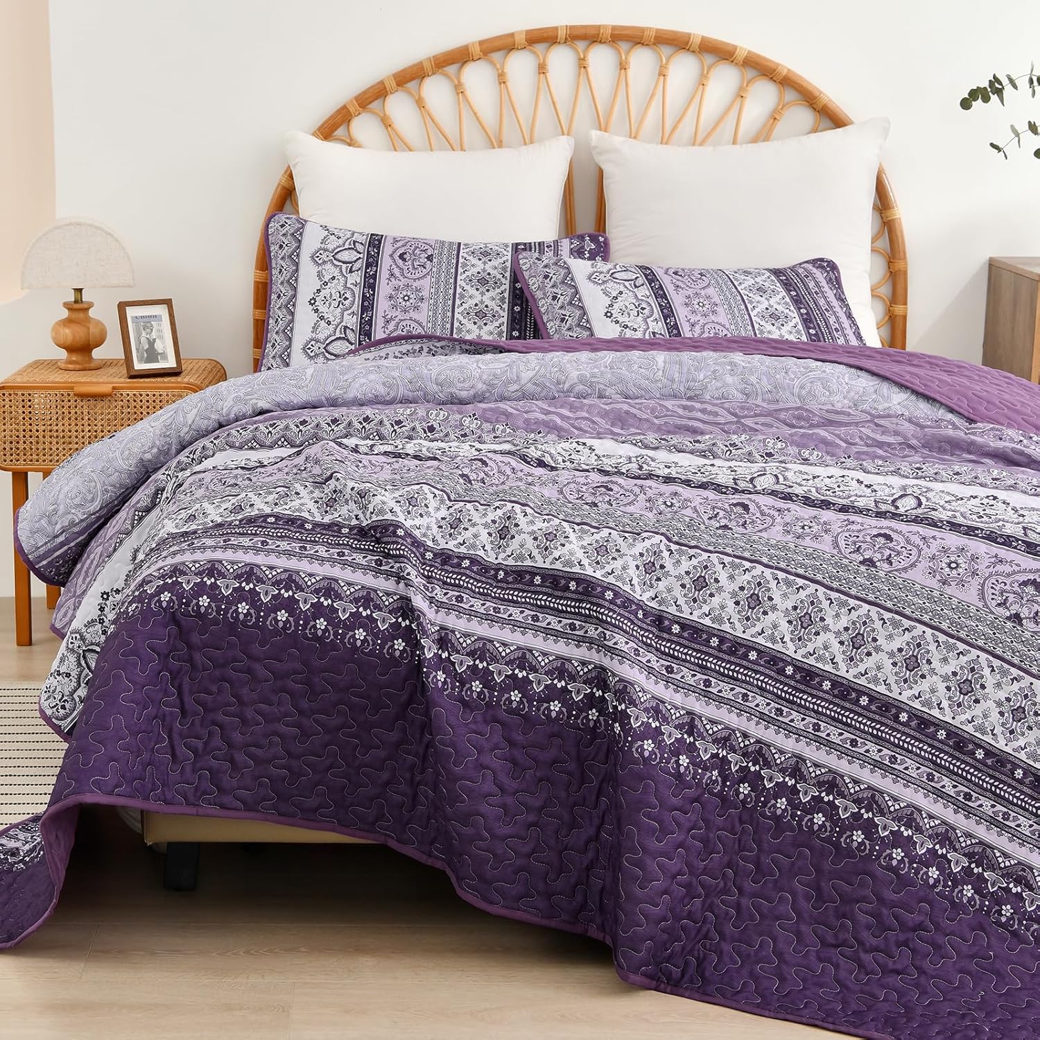Elegant Peony purple Soft 3 Pc Bedspread & Pillow Cover Set on bed with white pillows and rattan headboard in bedroom setting