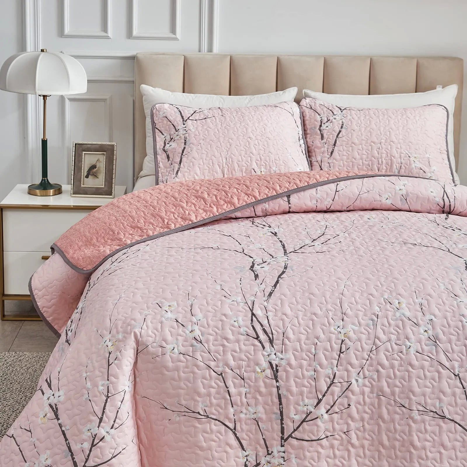 Versatile Quilted Coverlet and Pillowcases Set: Adapts to Every Season - Queen size in pink floral design on bedzy bed