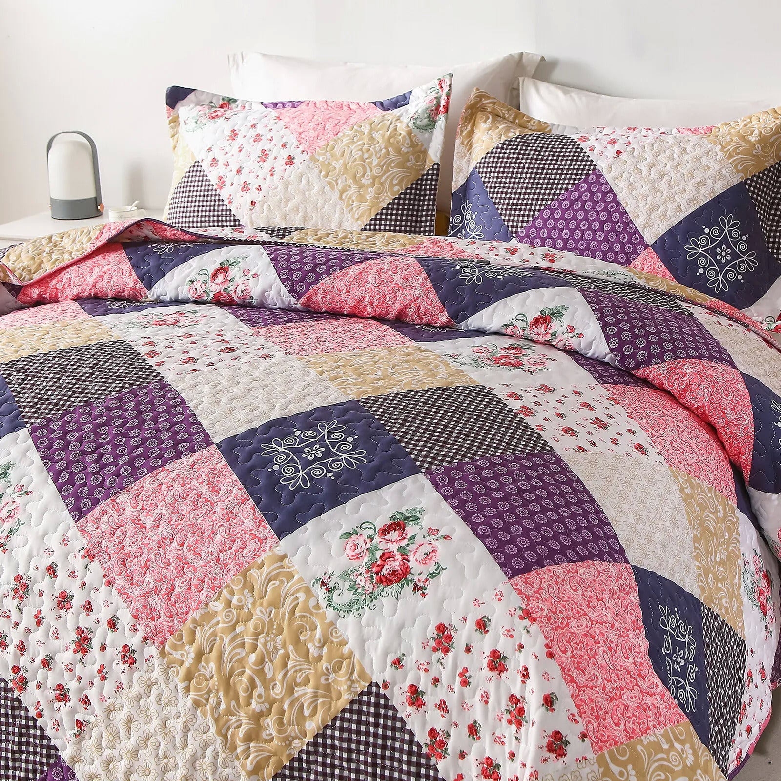 Intricate Quilted coverlet and pillowcovers set: Attention to Detail - Queen size with floral and geometric patchwork design on bed