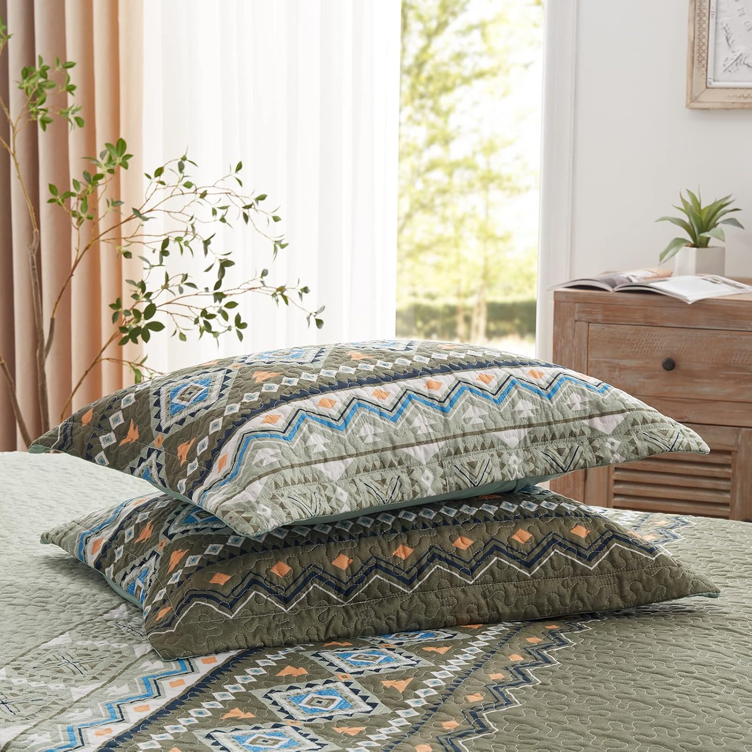 Quicksilver Quilted coverlet and pillowcovers set: Sleek and Modern - Queen size with geometric patterns on bed in bright bedroom
