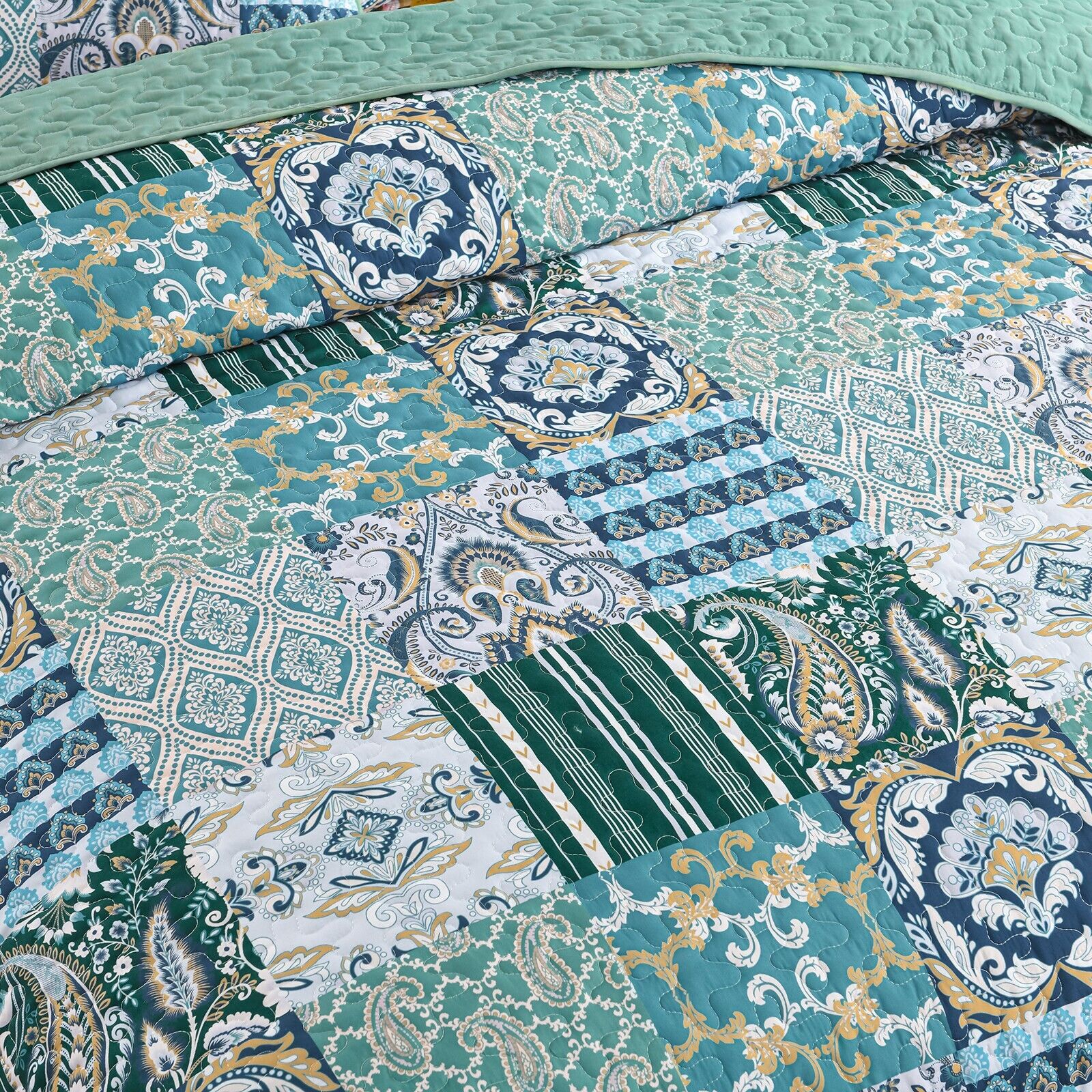 Exquisite Regal Purple 3 Pc Bedspread & Pillow Cover Set with intricate patchwork pattern in green, blue, and gold tones.