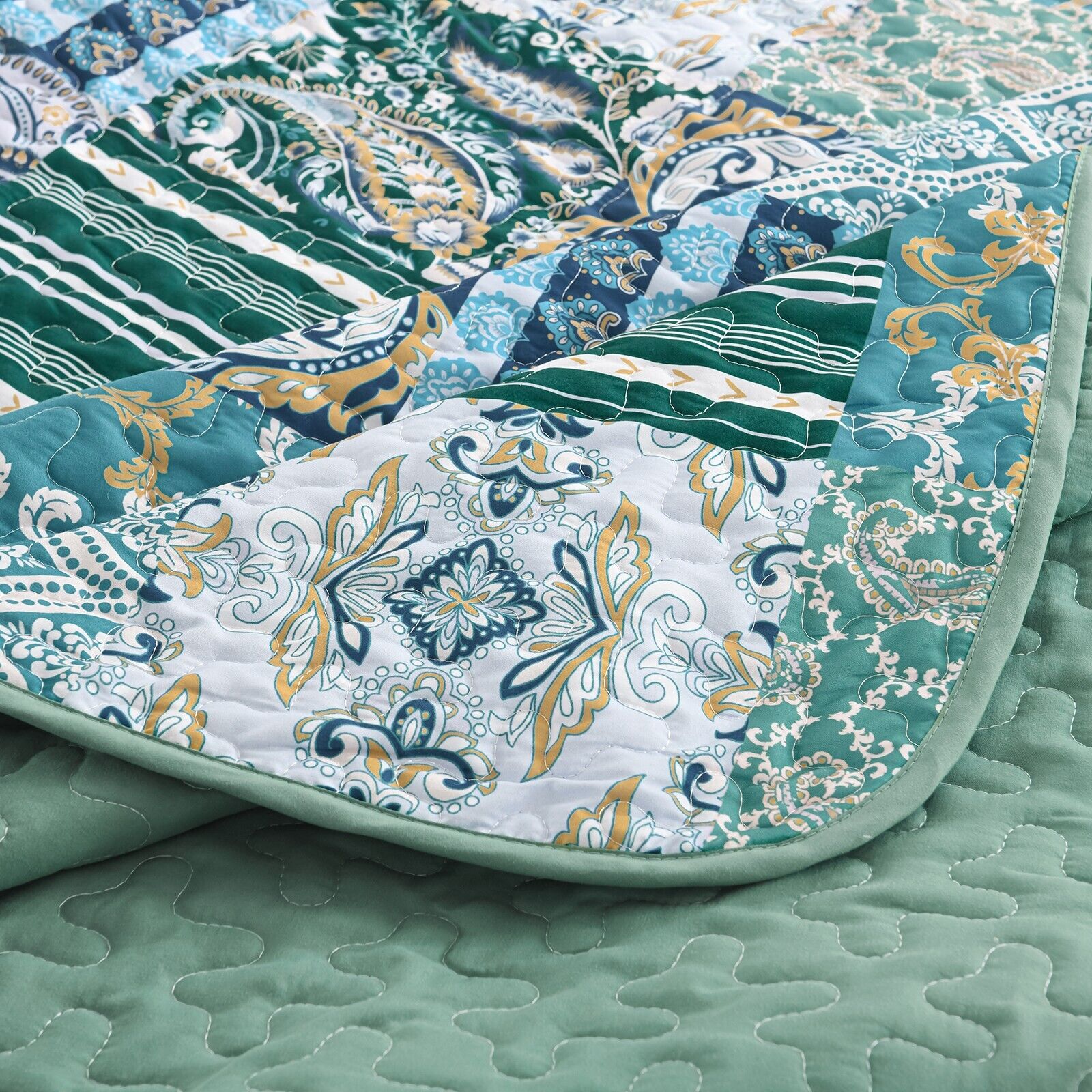 Exquisite Regal Purple 3 Pc Bedspread & Pillow Cover Set close-up of detailed quilt pattern and green quilted underside