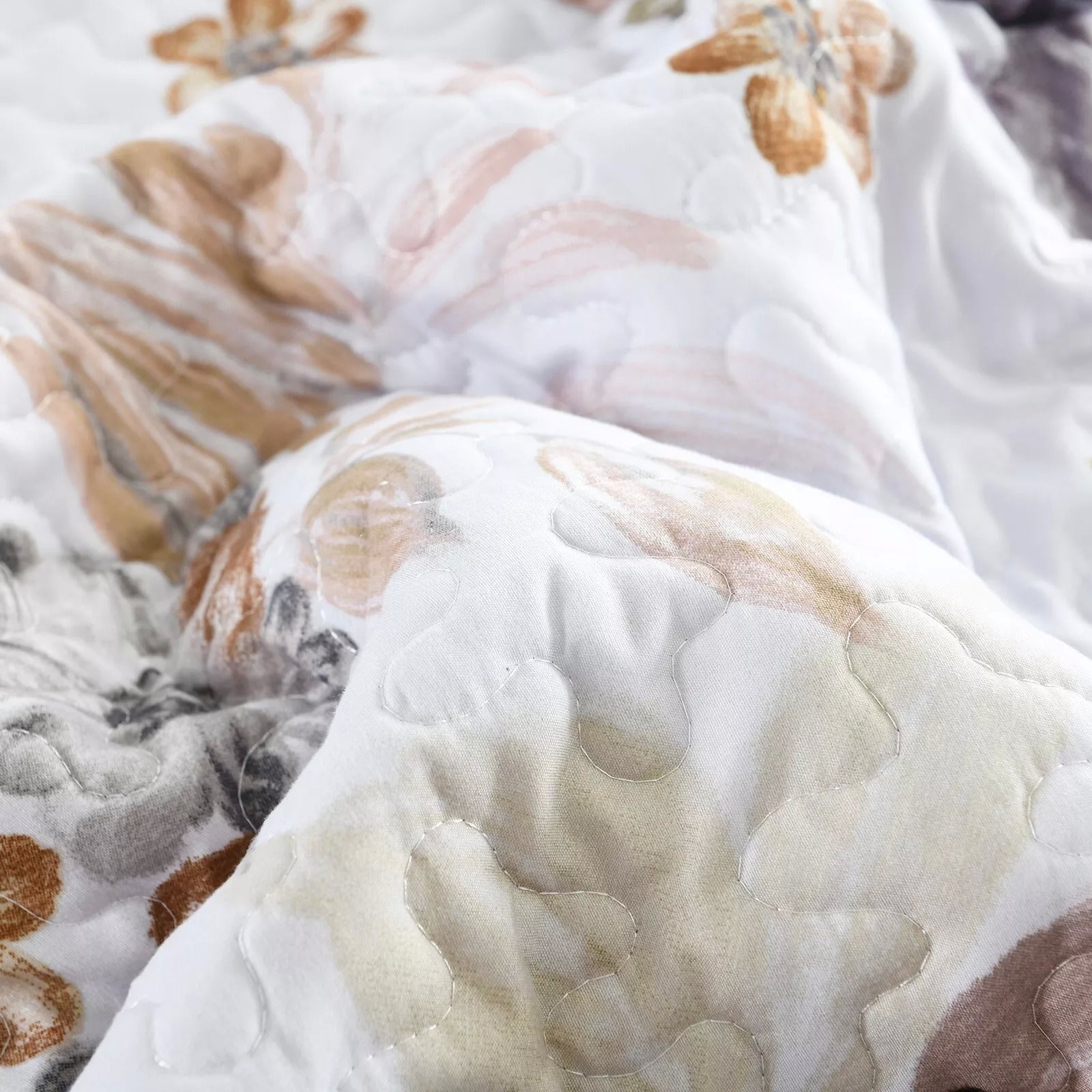 Close-up of Zen Quilted bedspread and pillowcovers set: Find Your Inner Peace - Queen size with floral quilted design and soft fabric texture