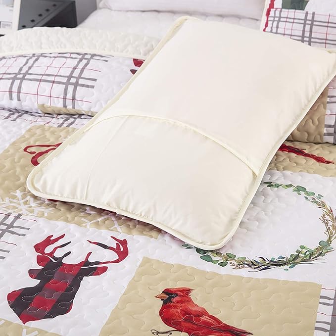 Festive Christmas Red & Green Queen Bedspread Set featuring quilted holiday patterns with reindeer and cardinal bird design on bedzy bed