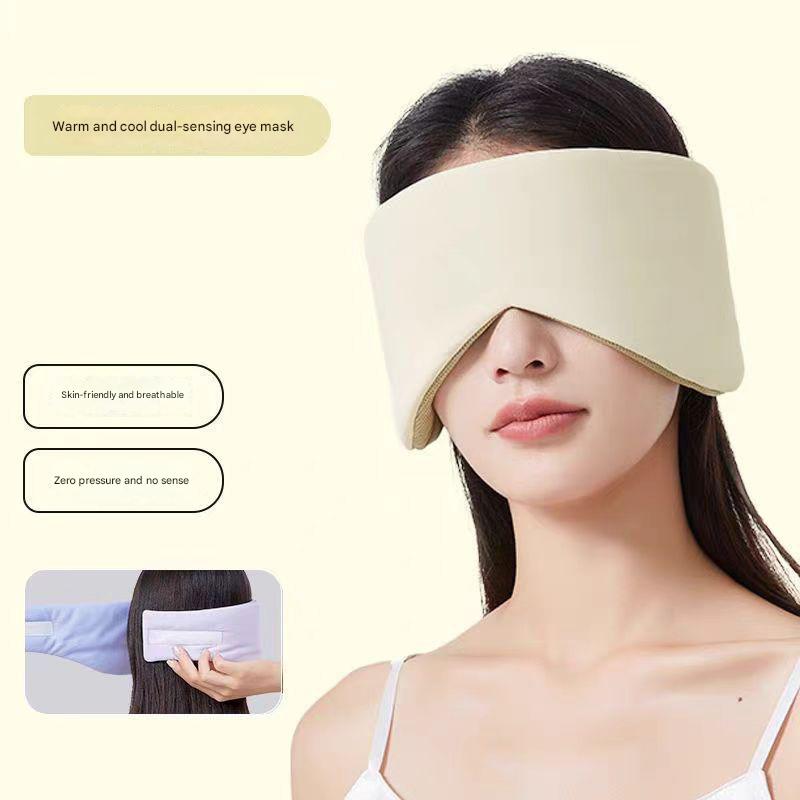 Beige Reversible All-Season Sleep Mask - Cooling & Warming with Sound Muffling Ear Covers on woman against cream background