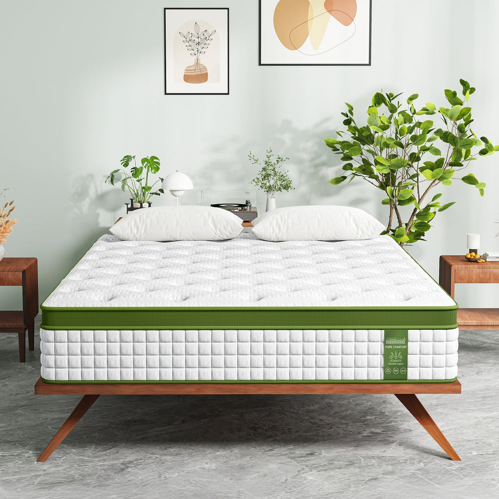 Pure Comfort Hybrid Euro Top Mattress 34cm Thick - Queen on wooden frame with pillows and green plants in bedroom setting