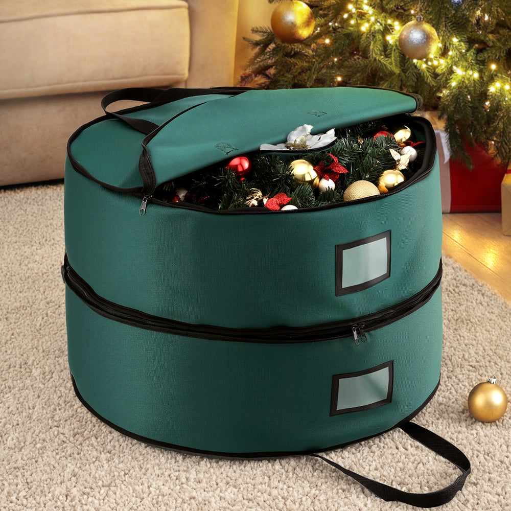 Christmas Garland Wreath Storage Bag 2-Tier Ornaments Holder 60cm in green Oxford fabric with zipper and handles, filled with holiday decor