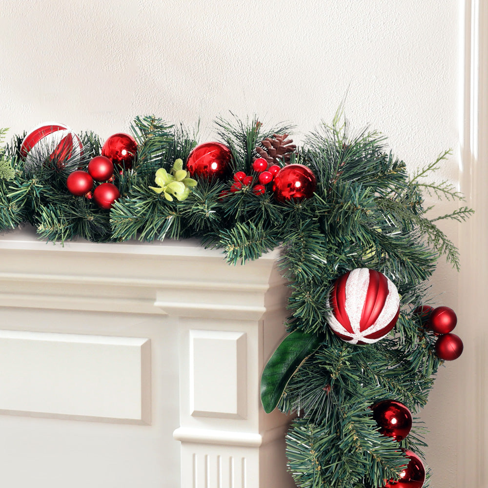 2.7m Christmas Garland with Decorations Xmas Wedding Party draped over white mantel with red ornaments and greenery