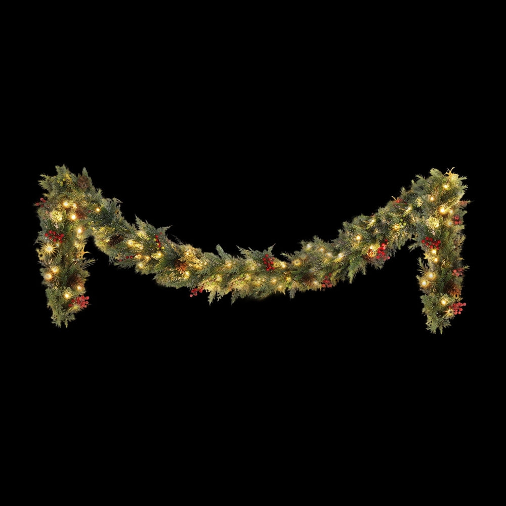 3M Christmas Garland Pre-lit LED with Pine Cones Xmas Decor Green featuring warm lights, pine cones, and red berries on black background