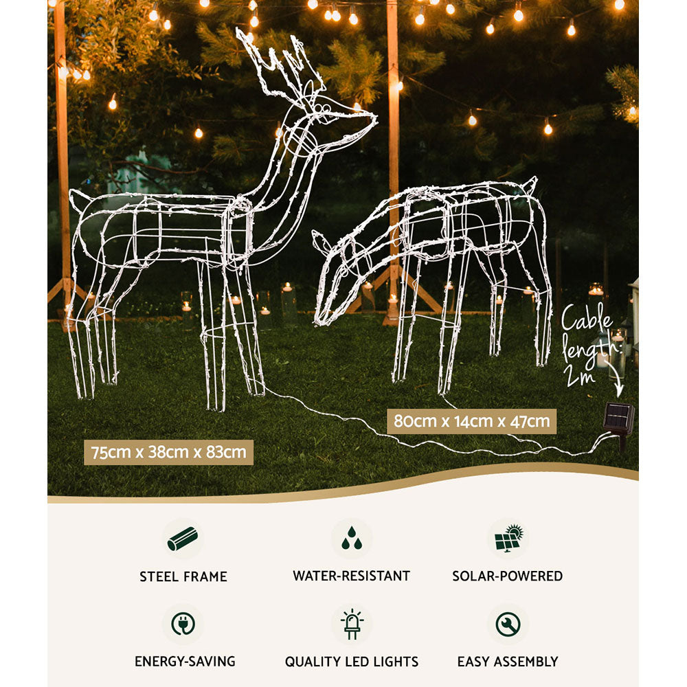 Christmas Motif Lights LED Rope Reindeer Waterproof Solar Powered set with two white LED reindeer in outdoor night setting