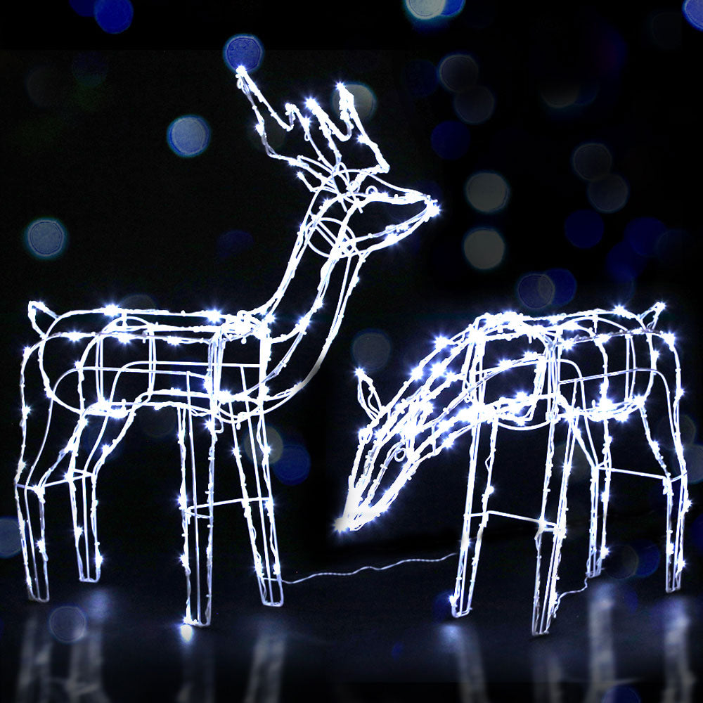 Christmas Motif Lights LED Rope Reindeer Waterproof Solar Powered with two illuminated reindeer in standing and feeding positions on black background