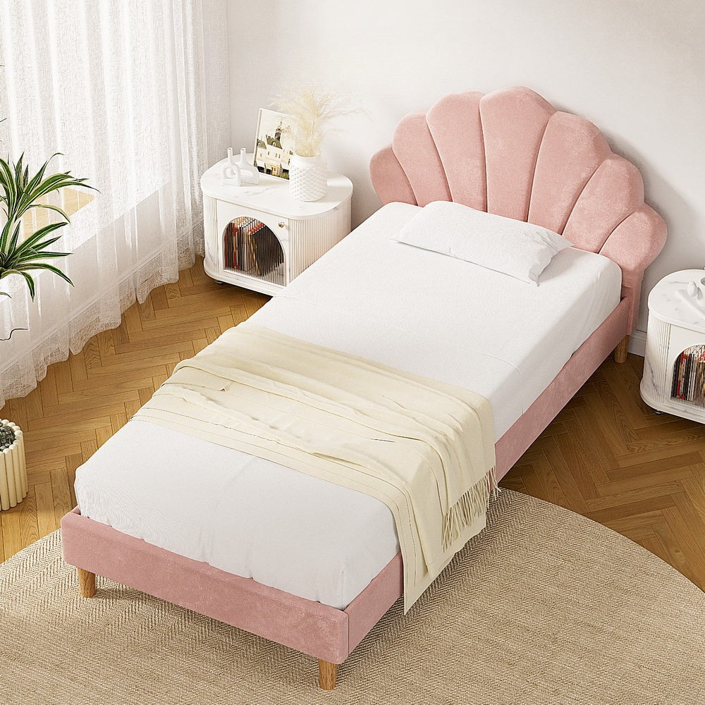 Rosie King Single Bed Frame - Pink Velvet with scalloped headboard and wooden legs, styled in bright bedroom setting