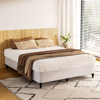 Mason Queen Bed Frame Base Grey upholstered fabric with black legs in modern bedroom setting with natural light
