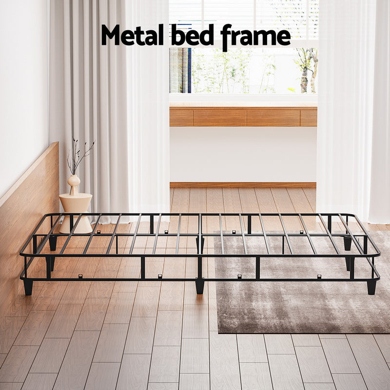 Mason Queen Bed Frame Base Grey metal frame with sturdy slats in bright modern bedroom setting with natural light