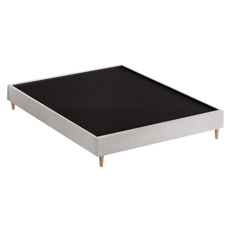 Zora Double Bed Frame Base Beige with wooden legs and fabric upholstery, sturdy design for bedroom furniture by Bedzy