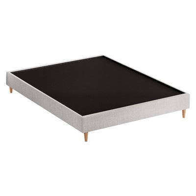 Zora Queen Bed Frame Base Beige with wooden legs and fabric upholstery, minimalist design for bedroom furniture.