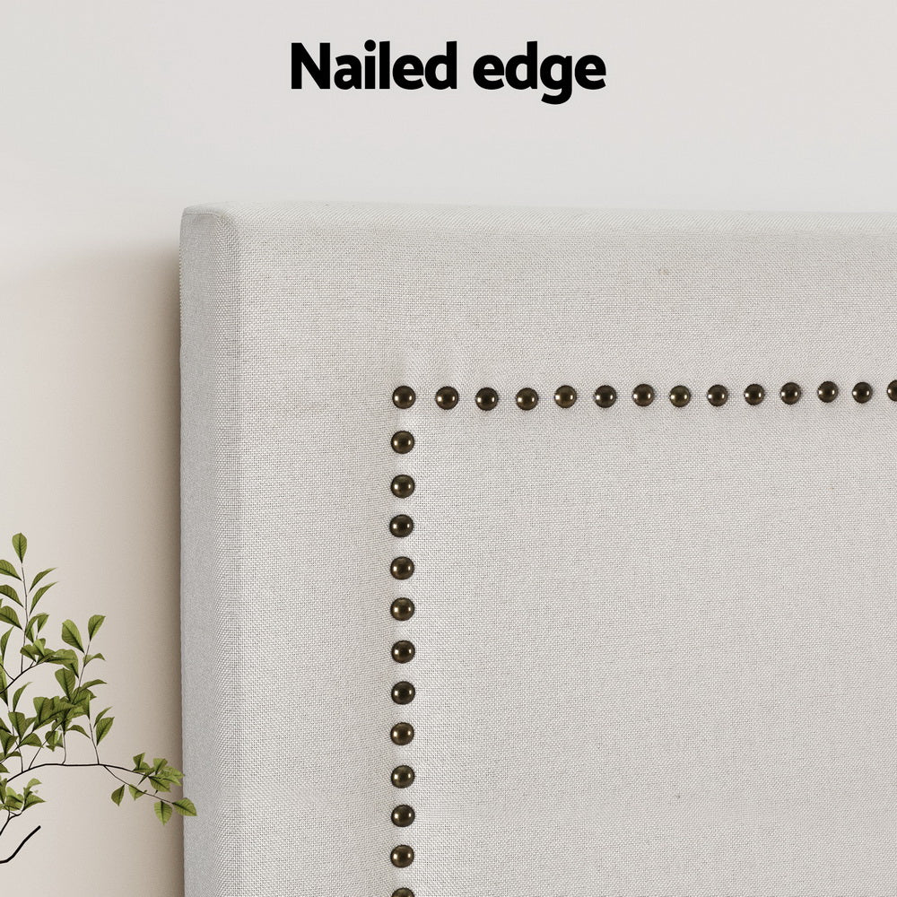 Rive Queen Bed Headboard with Upholstered Fabric & Nail-Edge Design - Beige close-up showing nailhead trim detail