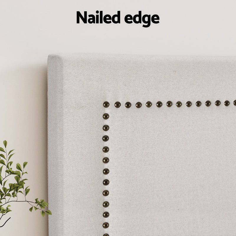 Rive Queen Bed Headboard with Upholstered Fabric & Nail-Edge Design - Beige close-up showing nailhead trim detail