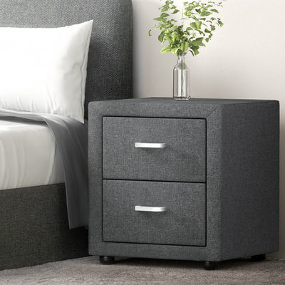 2X Bedside Table 2 Drawers Side Table Fabric - CADEN Grey with silver handles next to gray upholstered bed frame