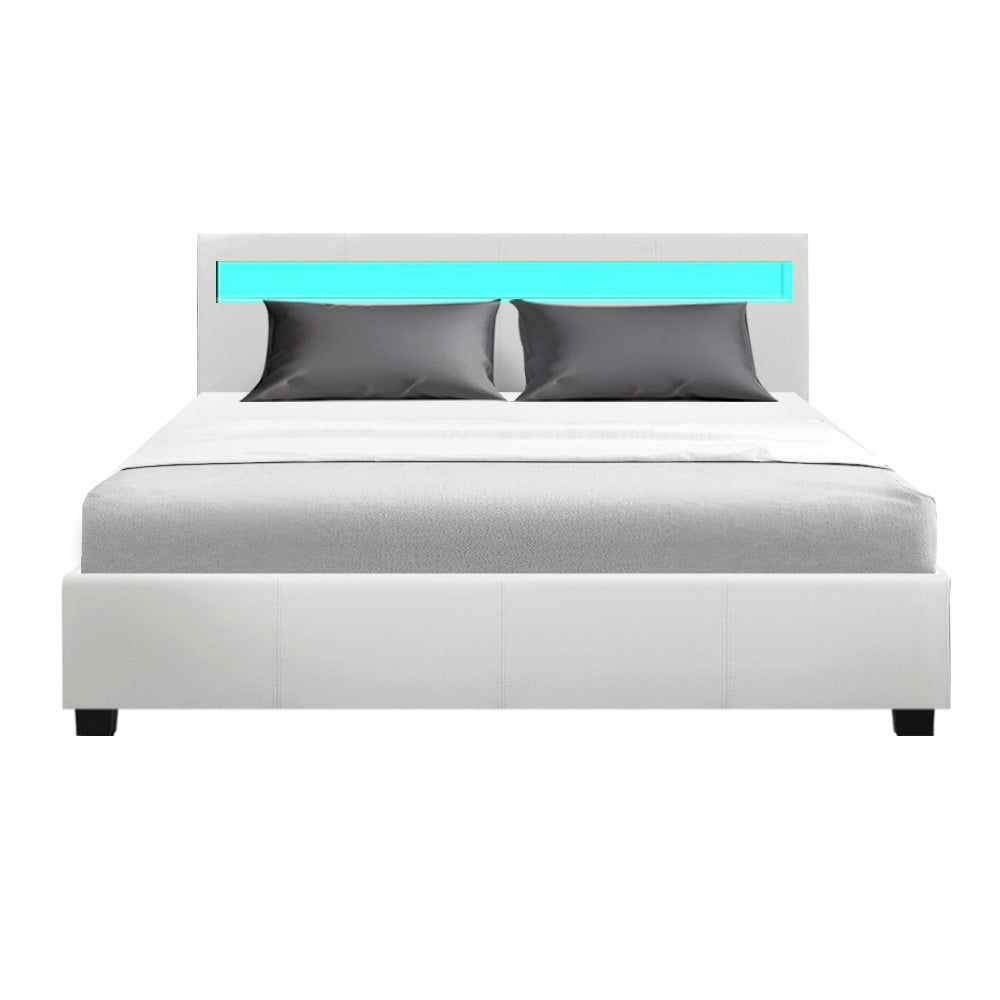 Wanda Queen Gas Lift Storage Bed Frame with LED Lights – White upholstered bed with illuminated headboard and gray pillows