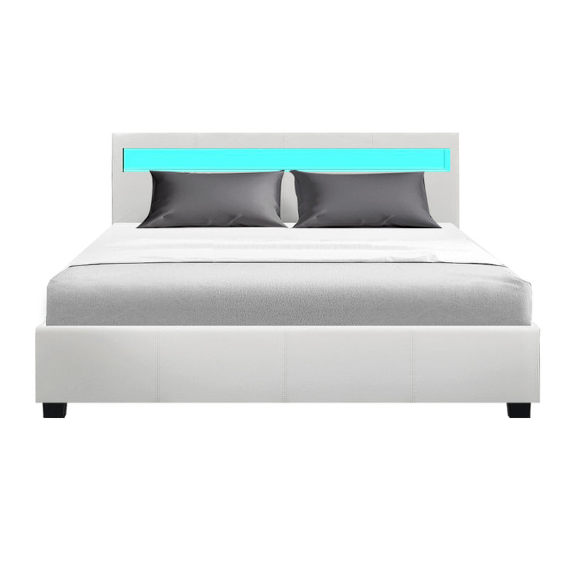 Wanda Queen Gas Lift Storage Bed Frame with LED Lights – White upholstered bed with illuminated headboard and gray pillows