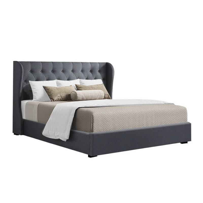 Elouera King Frame With Gas Lift Storage Charcoal upholstered bed with tufted headboard and plush cushioning in bedroom setting
