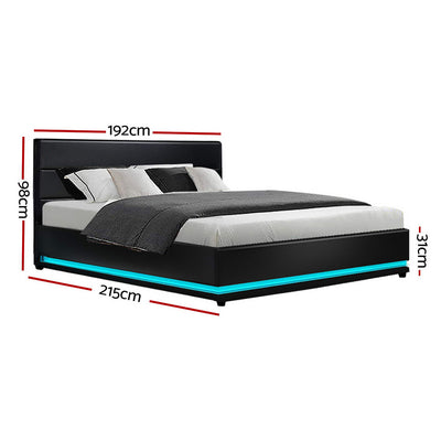 Henley King Gas Lift Storage Bed Frame with LED Lights – Black in black PVC leather with blue LED base lighting and mattress.