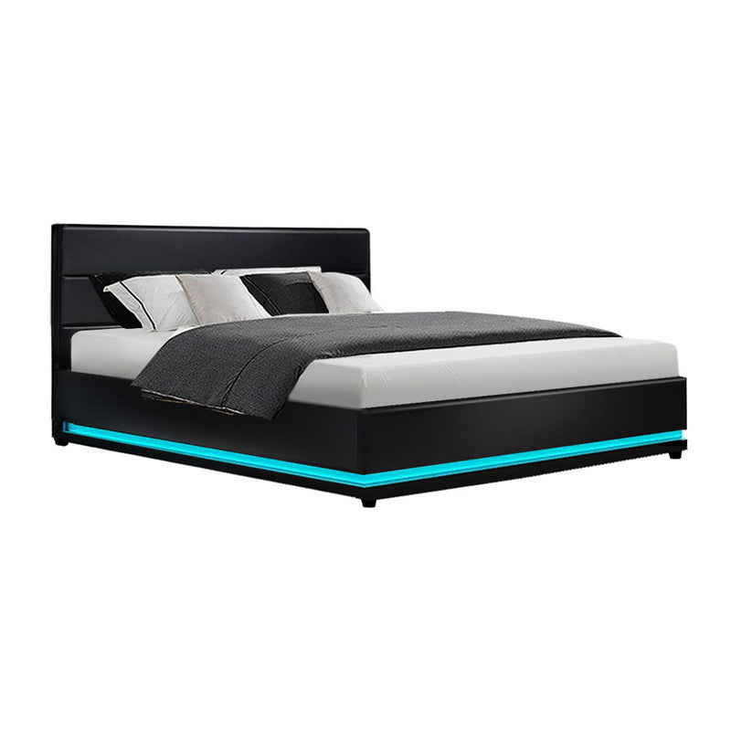 Henley Queen Gas Lift Storage Bed Frame with LED Lights – Black, upholstered with blue LED base lighting and pillows on mattress