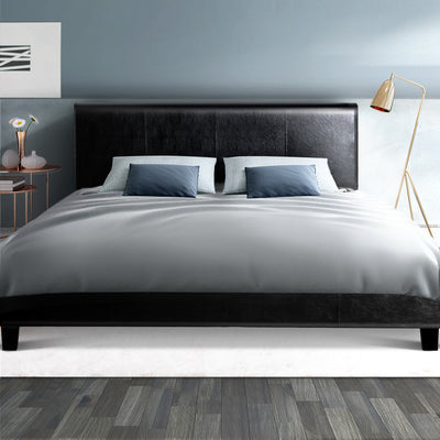 Coogee Double Bed Frame Black with sleek PVC leather upholstery, modern design, and sturdy wooden legs in a bedroom setting