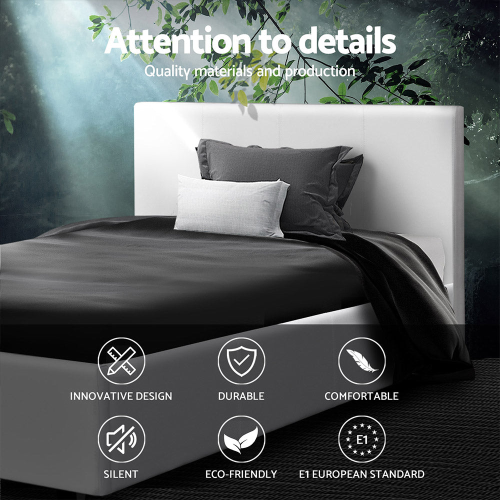 Coogee King Single Bed Frame White with sleek PVC leather upholstery, modern design, and black bedding in bedroom setting