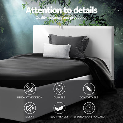 Coogee King Single Bed Frame White with sleek PVC leather upholstery, modern design, and black bedding in bedroom setting