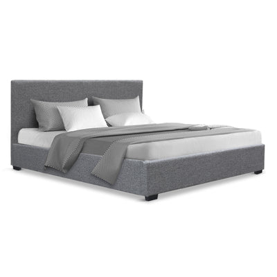 Elwood Gas Lift Storage Double Bed Frame Grey upholstered in faux-linen fabric with matching pillows and bedding