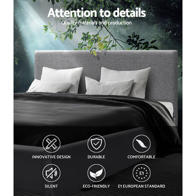 Elwood Gas Lift Storage Double Bed Frame Grey with grey upholstered headboard and white pillows in bedroom setting