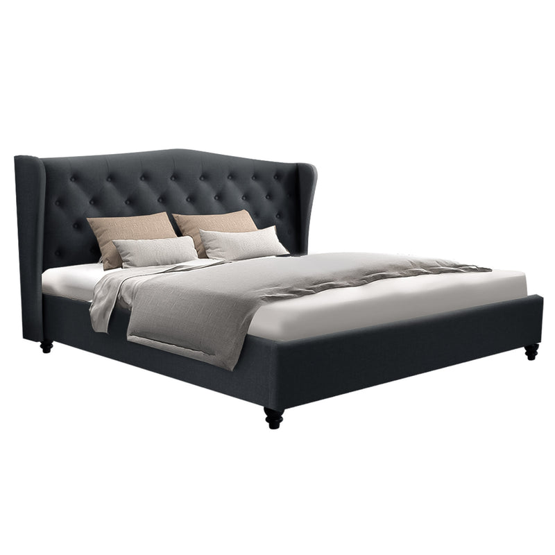 Altona King Bed Frame Charcoal with tufted wingback headboard and upholstered base, styled with neutral bedding and pillows.