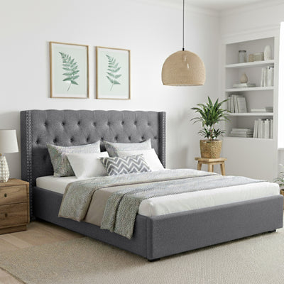 Lucas King Gas Lift Storage Bed with Tufted Headboard – Grey in styled bedroom with bedding and decor accents