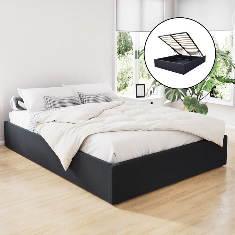 Toki Gas Lift Queen Bed Frame Base with Storage Charcoal, upholstered, shown in bedroom with bedding and gas lift storage feature inset.