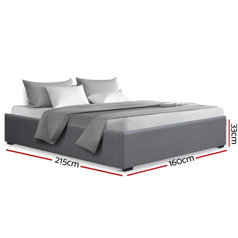 Toki Gas Lift Queen Bed Frame Base with Storage Grey, upholstered grey fabric, with pillows and bedding on white background