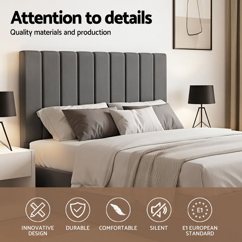 Velantra Queen Gas Lift Storage Bed with Headboard – Grey featuring vertical upholstered panels and modern bedroom styling.