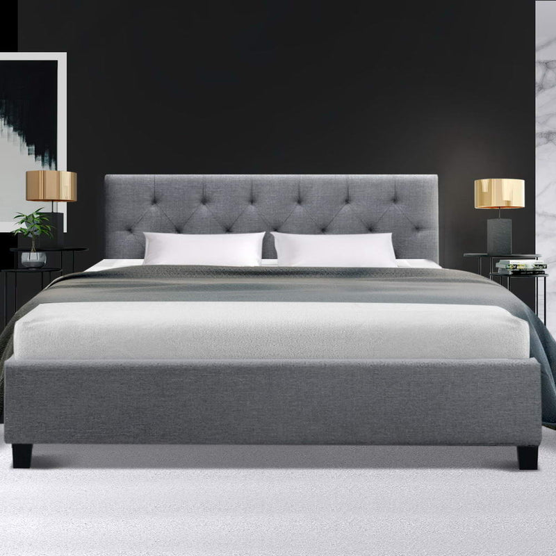 Hyams Double Bed Frame Grey with tufted upholstered headboard and low footboard in a modern bedroom setting