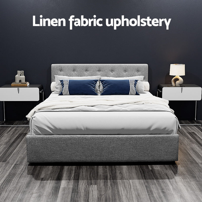 Dorilla Gas Lift Storage Queen Bed Frame - Grey with linen fabric upholstery, tufted headboard, and modern bedroom setup