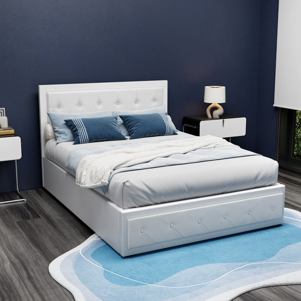 Bronte Storage Double Bed Frame White with tufted PVC leather, gas lift storage, dressed with blue and white bedding in modern bedroom