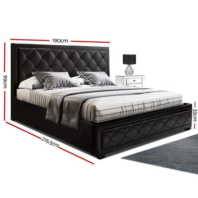 Bronte Storage King Bed Frame Black with tufted PVC leather headboard, black finish, and gas lift storage, shown with bedding and pillows