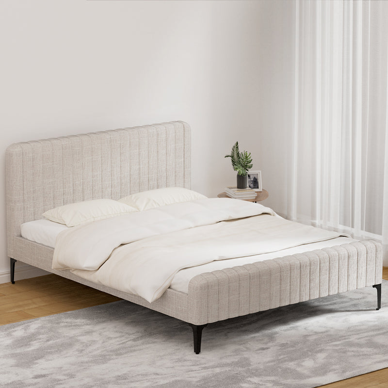 Burleigh Queen Bed Frame Beige with upholstered headboard and footboard, black legs, in a minimalist bedroom setting