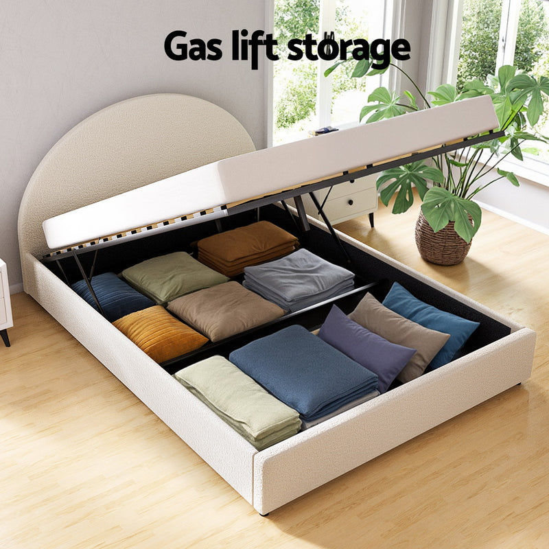 Ella Gas Lift Double Bed Frame - Beige Bouclé Upholstery with gas lift storage and neatly organized bedding inside the frame