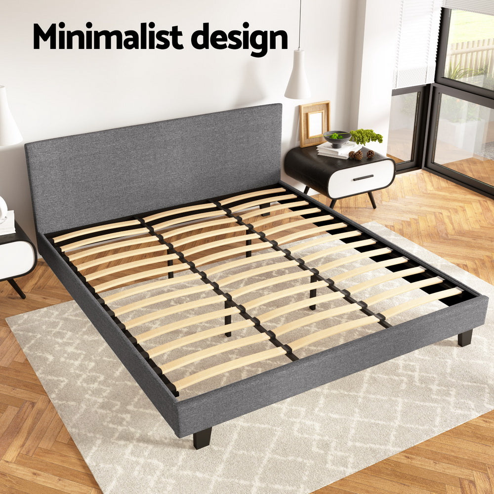 Coogee King Bed Frame Grey with upholstered headboard, wooden slats, and minimalist design in a modern bedroom setting